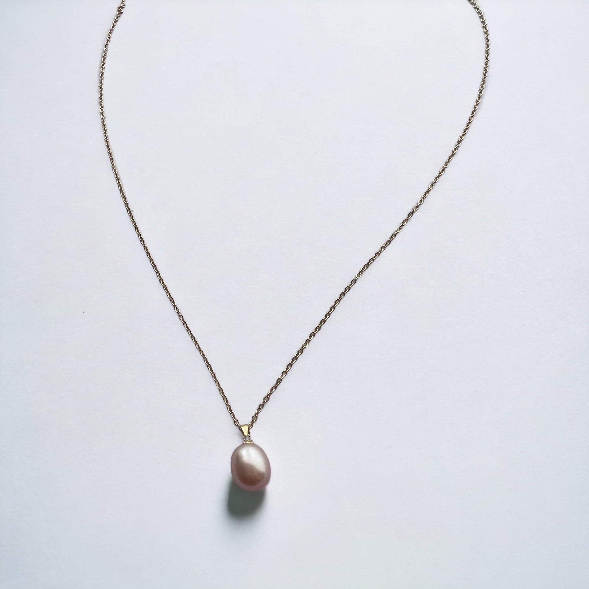 Collier de perles roses en or 18 carats